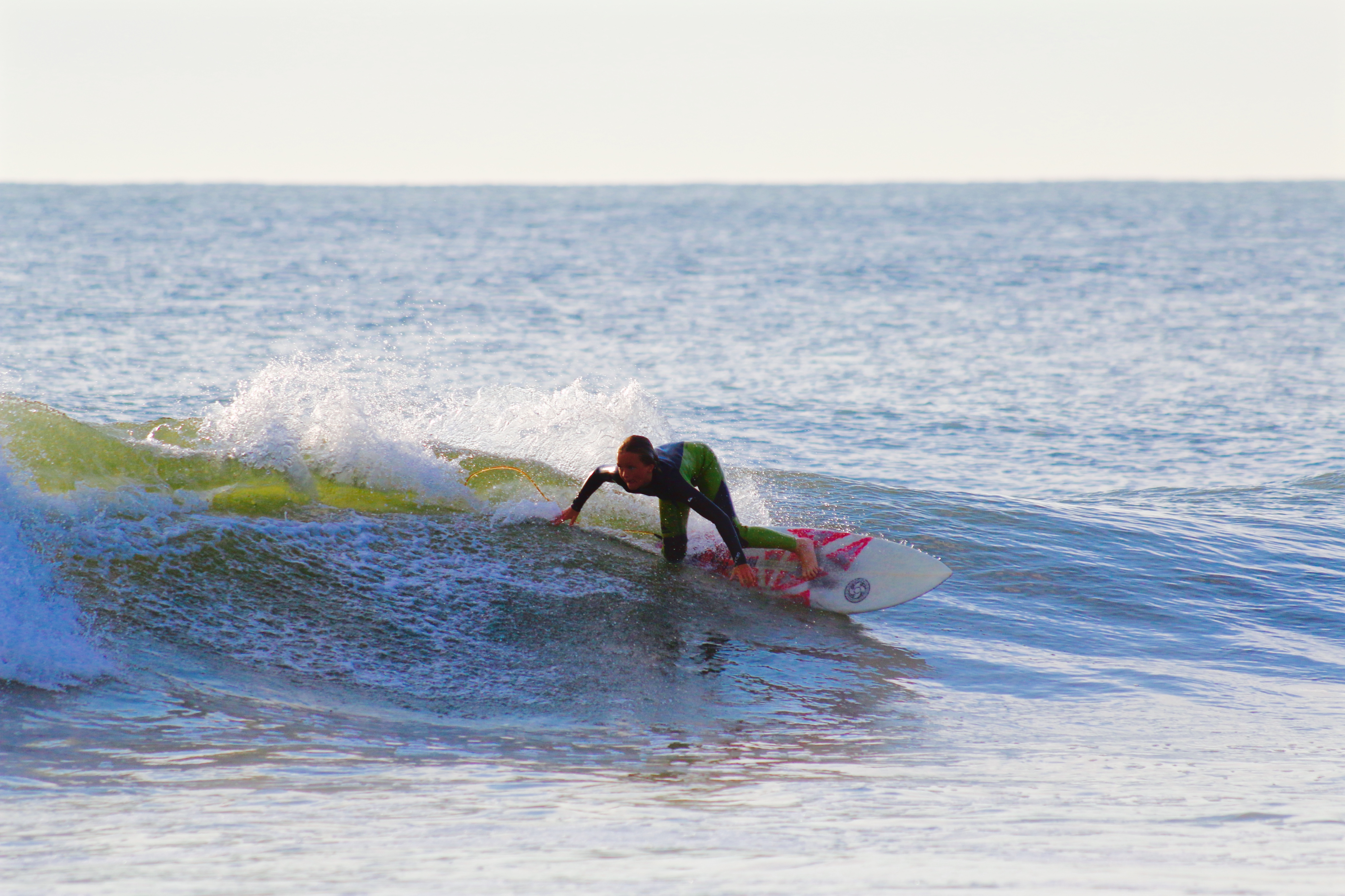 Rhett sizing up the pocket as he cuts back on his S&A surfboard.