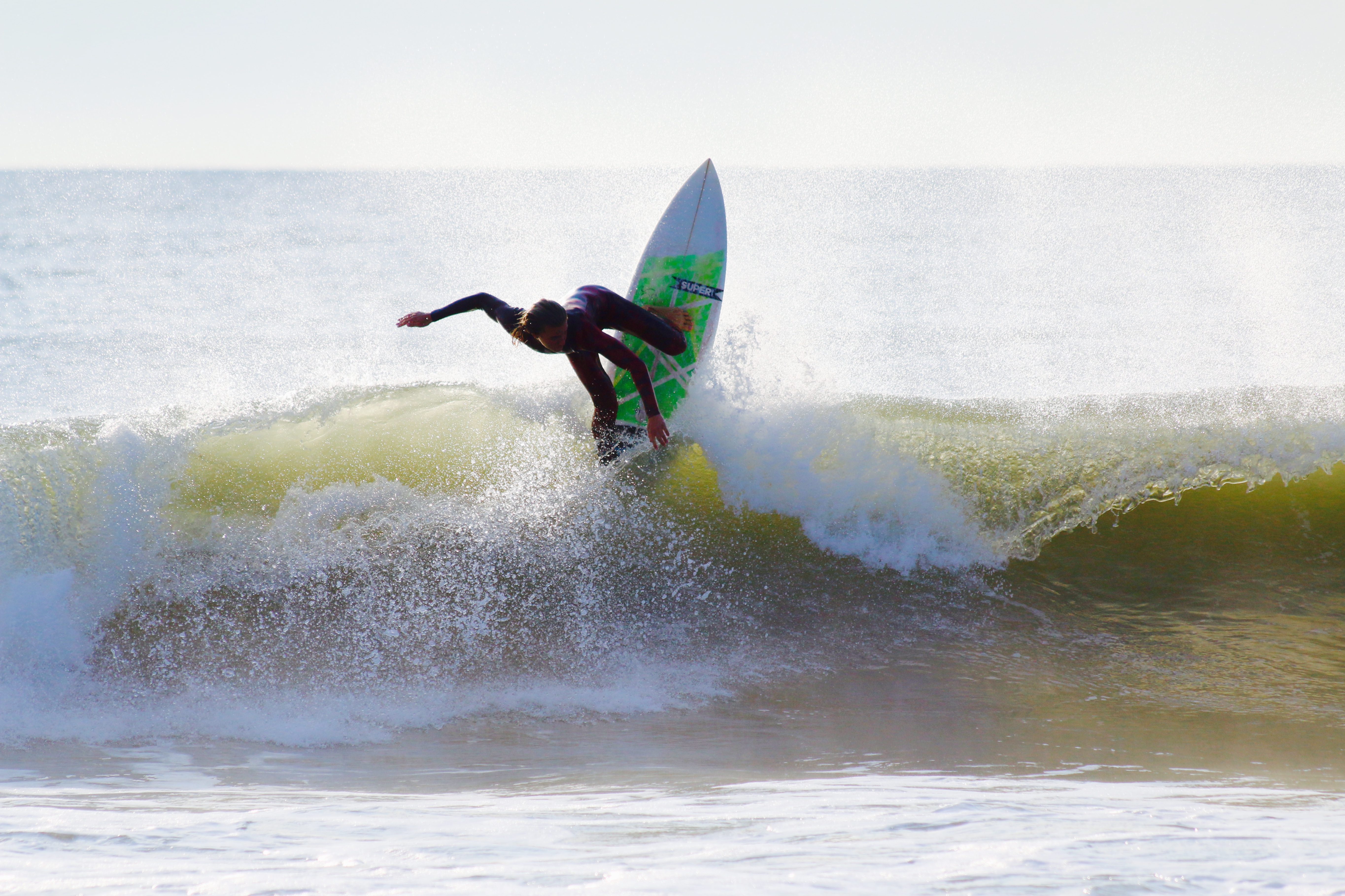 Noah Barnas letting us know what time it is; time to surf!